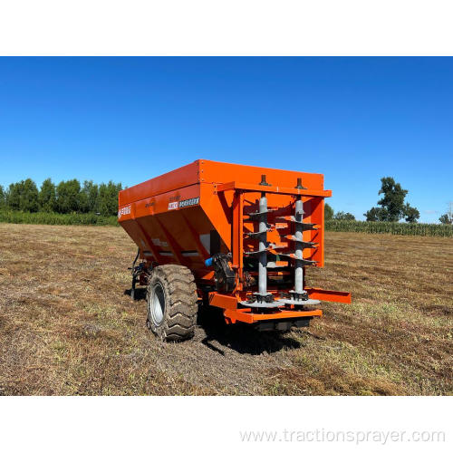 Agricultural tractor manure spreader